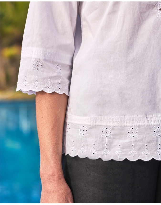 white embroidered blouse