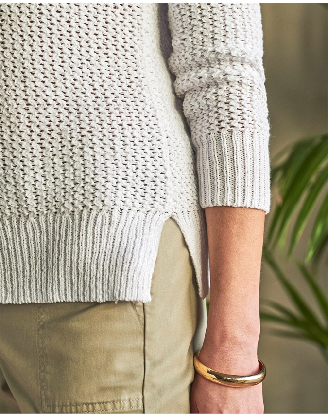 white textured sweater
